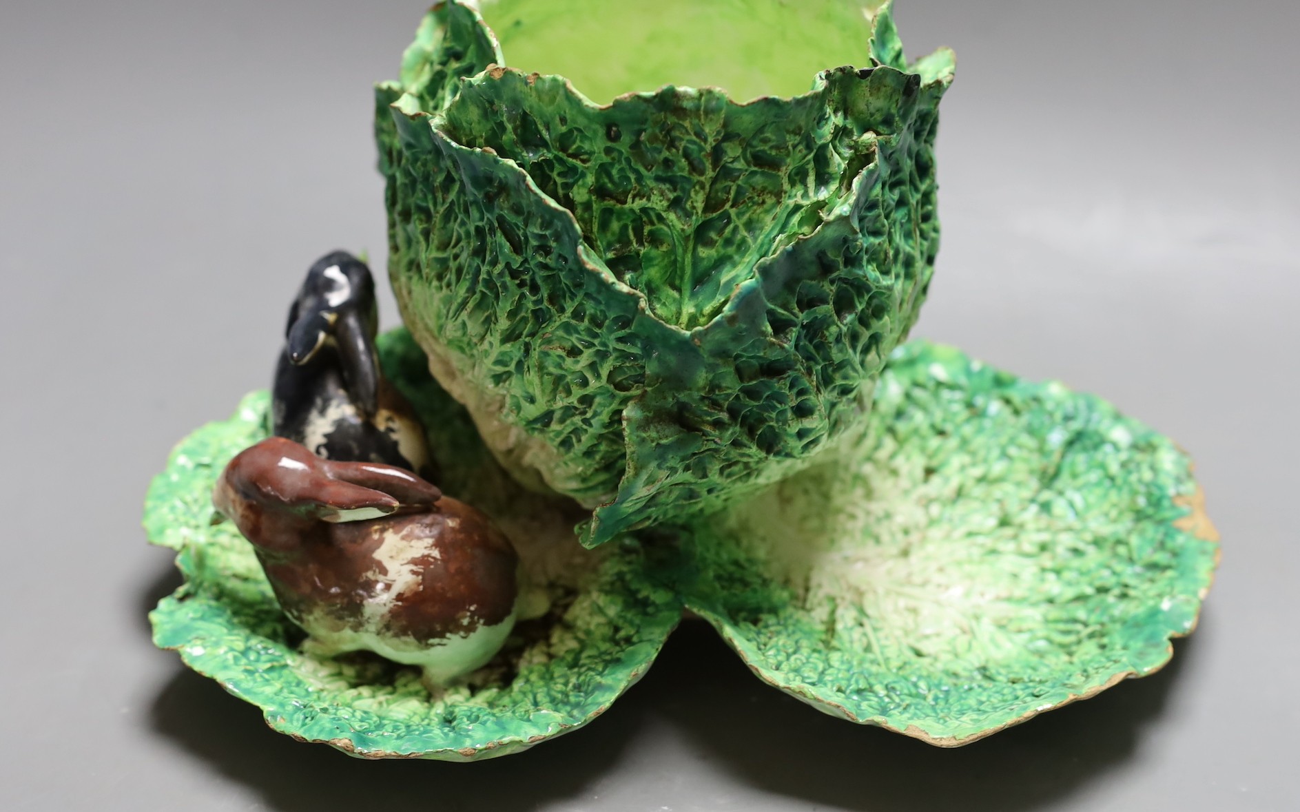 An unusual French earthenware rabbit and cabbage centrepiece. 16.5cm tall